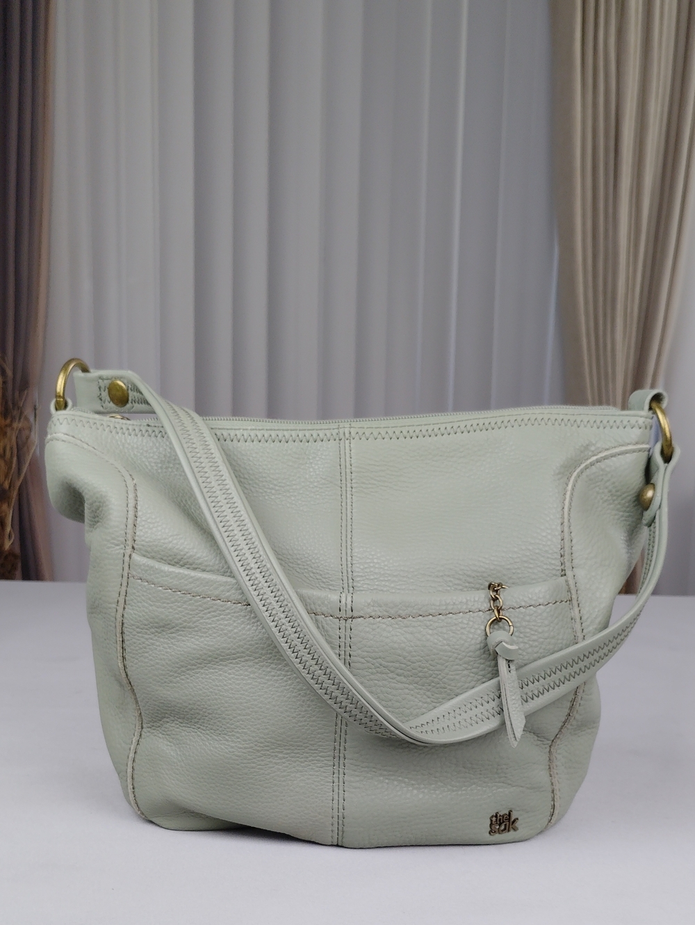 The Sak Hobo Pebble Leather Shoulder Bag.